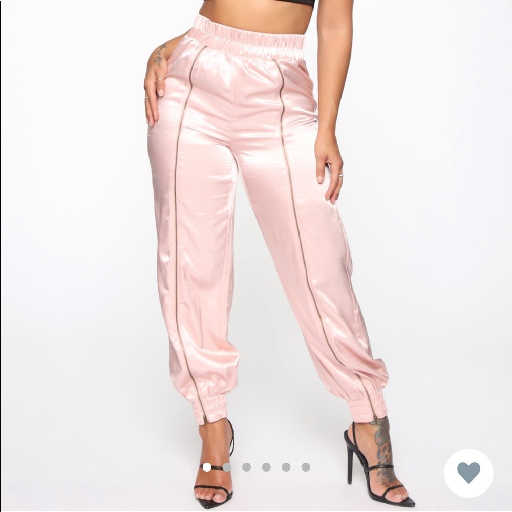 Pink satin joggers.